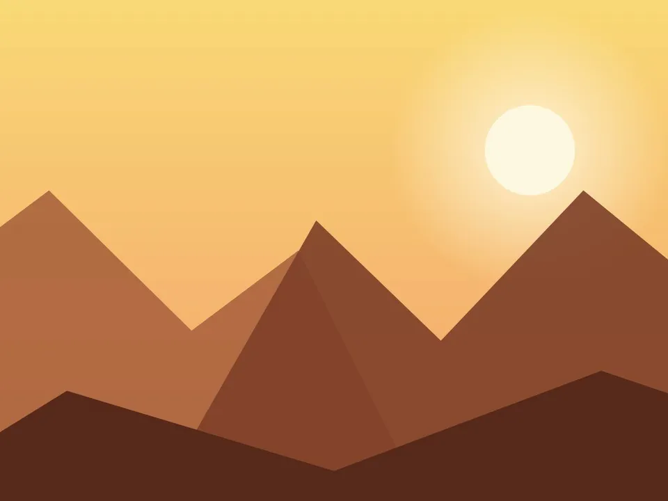 Atardecer cálido sobre la estepa con cerros lejanos