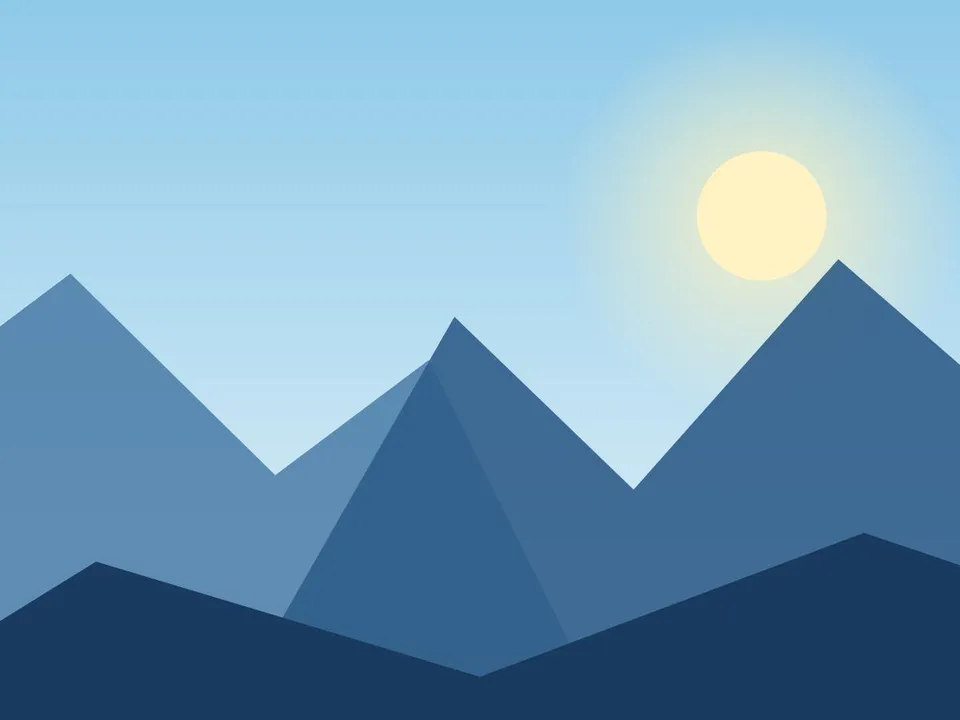 Vista de montañas nevadas al atardecer con cielo celeste