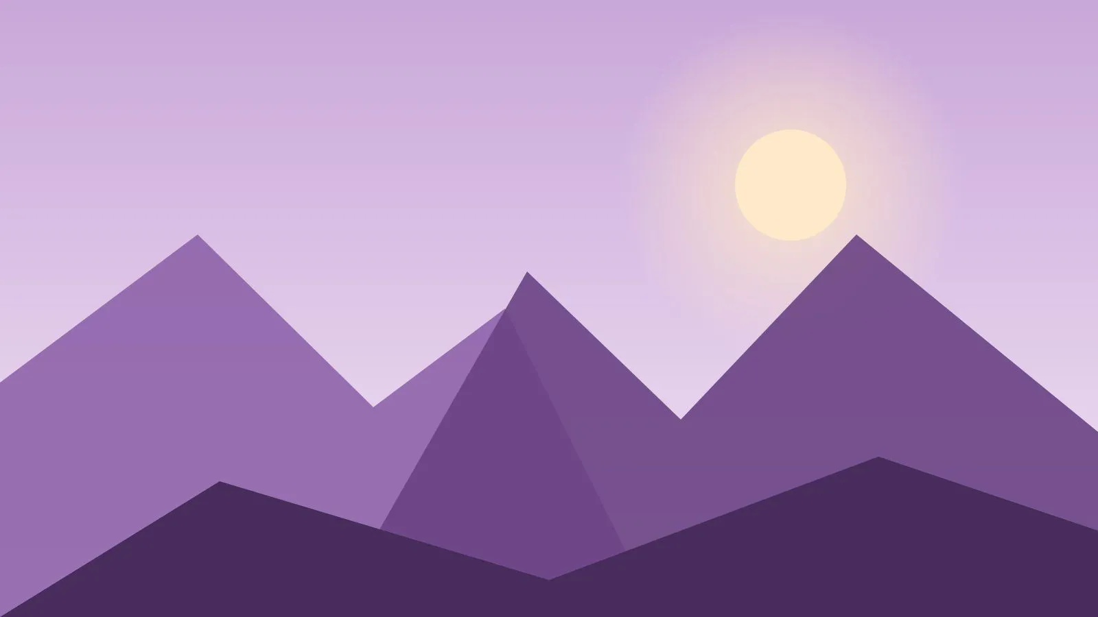 Atardecer violeta sobre el valle, con cerros suaves al fondo