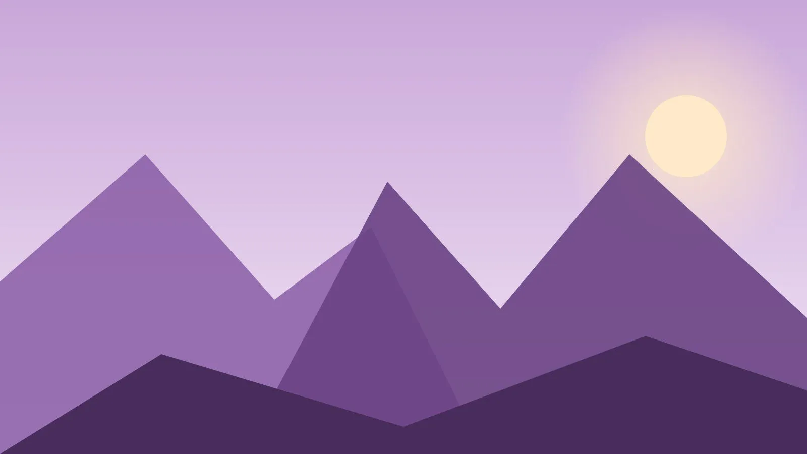 Montañas al anochecer con cielo violeta profundo