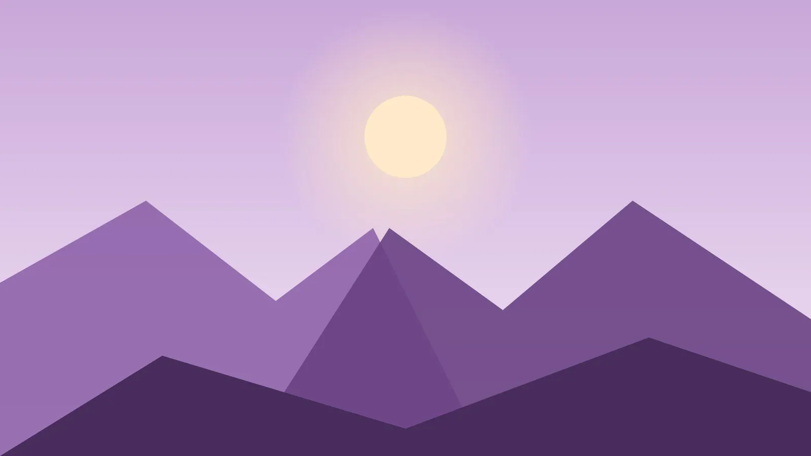 Cerros al atardecer en tonos lilas y ocres